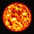 A closeup telescopic photo of a burning sun.